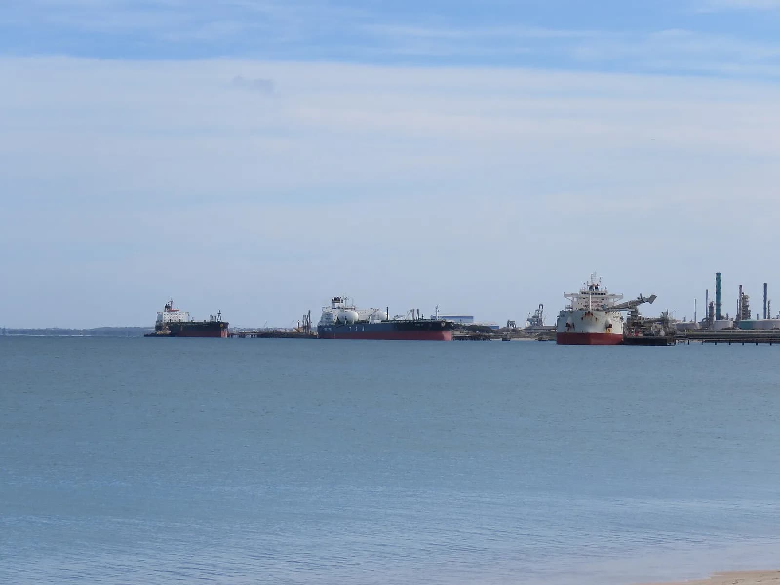 Hormuz Traffic Falls to 21 Transits a Day as Attacks Outrun the Truce